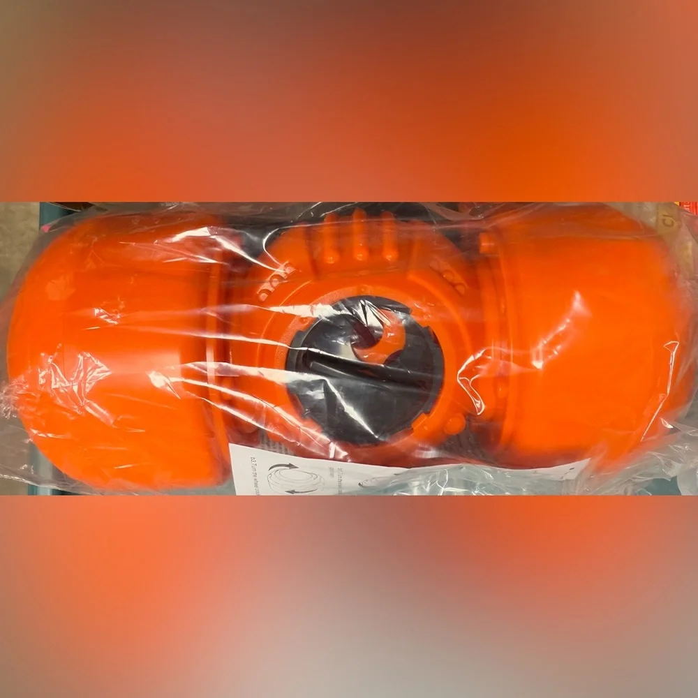 Large dog treat dispensing rolling bone toy Orange giggling sound $120 new